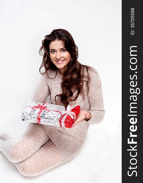 Happy Girl Giving You Christmas Present On White Background