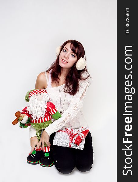 Happy Girl With Christmas Present On White Background