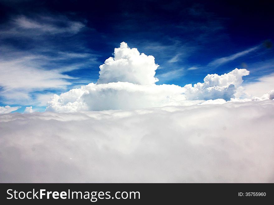 On a plane travel to Shenzhen, the plane triumph in the sky above the clouds, the heaven looks so fantastic, blue and clean. On a plane travel to Shenzhen, the plane triumph in the sky above the clouds, the heaven looks so fantastic, blue and clean