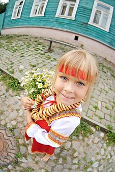 Russian Girl In National Costume With Bagels And Flowers Stock Images Russian Girl In National Costume With Bagels And Flowers Stock Images