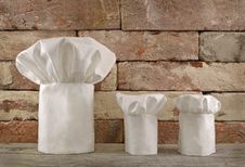 Three Chef S Toques On Brick Wall Royalty Free Stock Image Three Chef S Toques On Brick Wall Royalty Free Stock Image