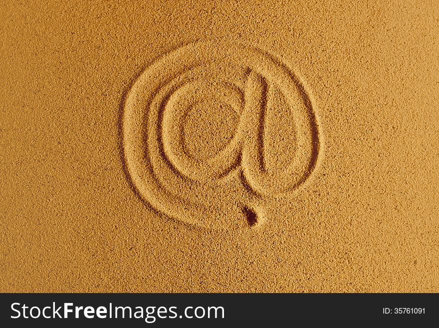 Email symbol drawn in the sand. Email symbol drawn in the sand