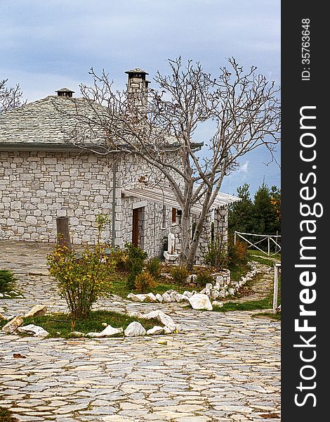 A small villa under the blue sky in a garden