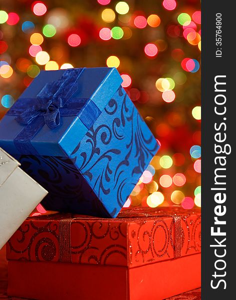 Christmas boxes on beautiful, bokeh, background. Christmas boxes on beautiful, bokeh, background