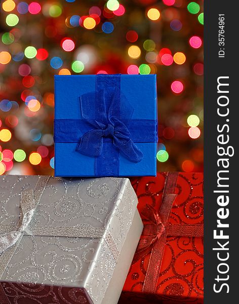 Christmas boxes on beautiful, bokeh, background. Christmas boxes on beautiful, bokeh, background