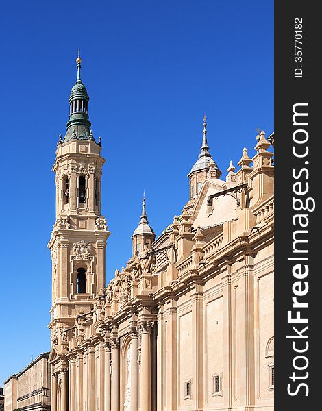 Closeup of Pilar Cathedral belfry against blue sky, Zaragoza, Spain. Closeup of Pilar Cathedral belfry against blue sky, Zaragoza, Spain