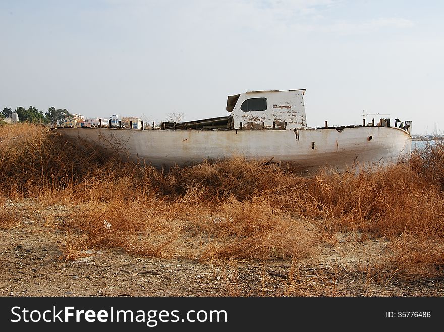 White Boat At The Cove