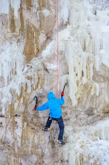 Young Man Climbing The Ice Royalty Free Stock Image