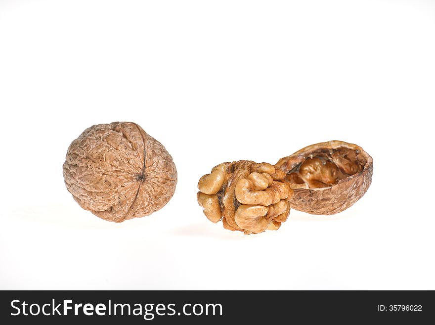 Walnuts on a white background.