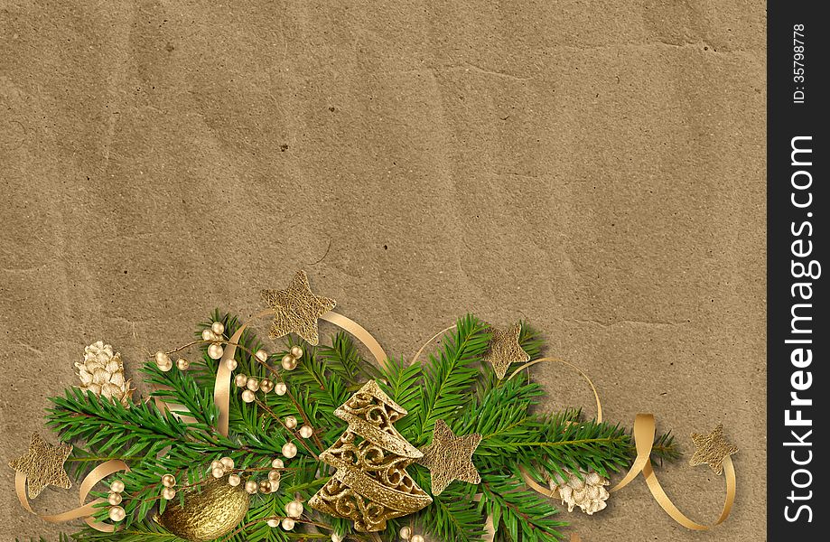 Christmas vintage cardboard background with fir branches and beautiful gold Christmas decorations. Christmas vintage cardboard background with fir branches and beautiful gold Christmas decorations