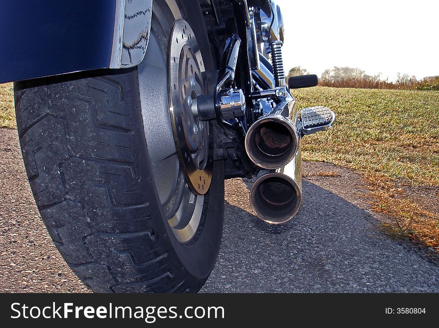 Tail Pipes and rear wheel on a motorcycle