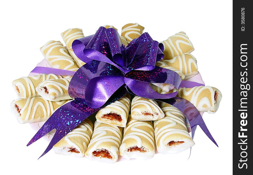 Sweet cookies with violet bow isolated