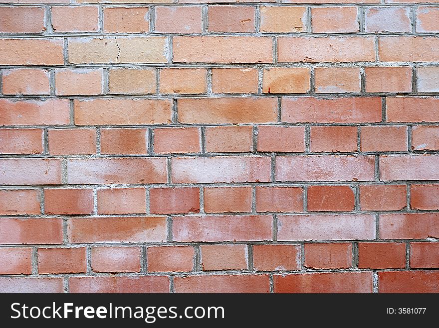 Wall of red bricks with cement layers. Wall of red bricks with cement layers