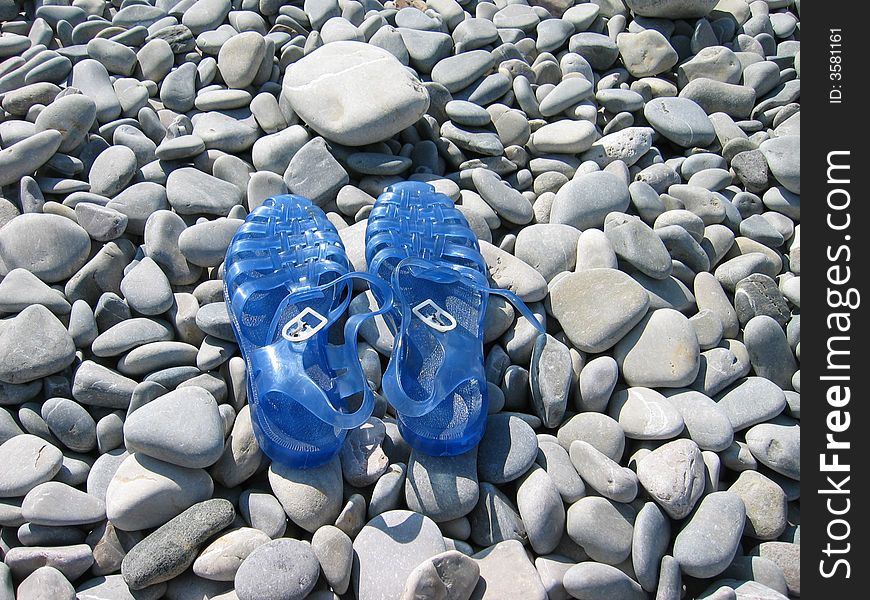 Beach stones and  sandals