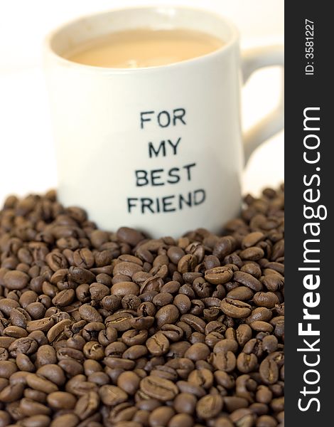 Cup of coffee for the best friend in coffee beans. Cup of coffee for the best friend in coffee beans