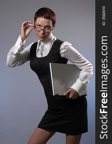 The business woman with a computer