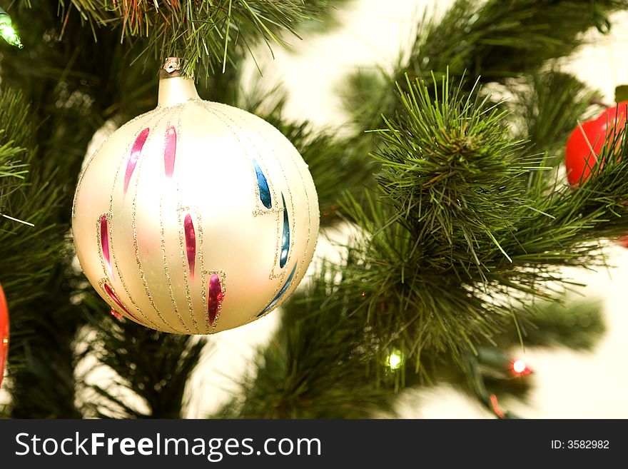 Glass ball hanging on christmas tree. Glass ball hanging on christmas tree