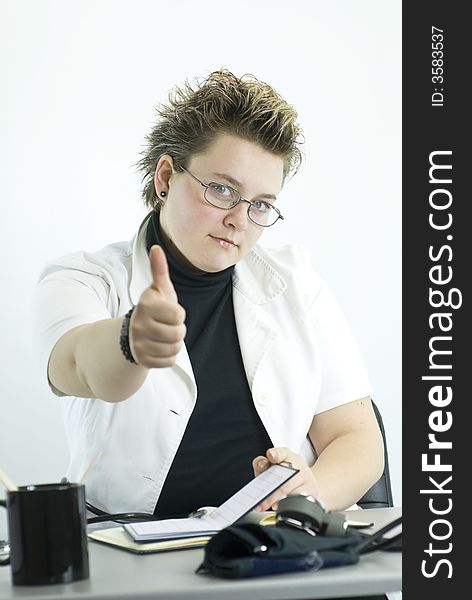 Female doctor showing thumbs up