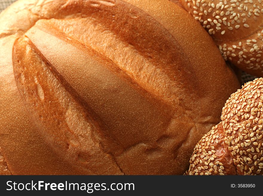 Various types of freshly baked bread, background. Various types of freshly baked bread, background