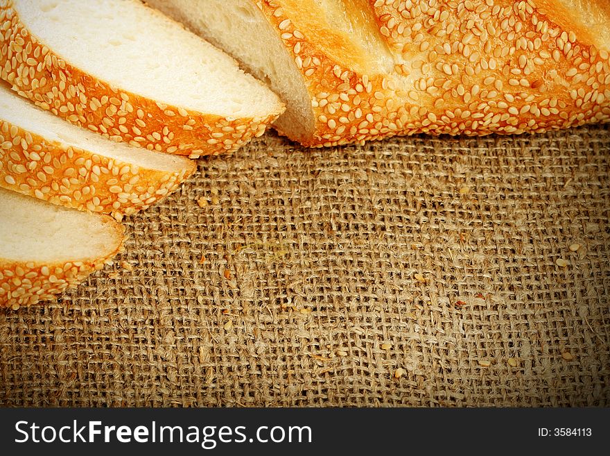 Fresh bread with sesame, background