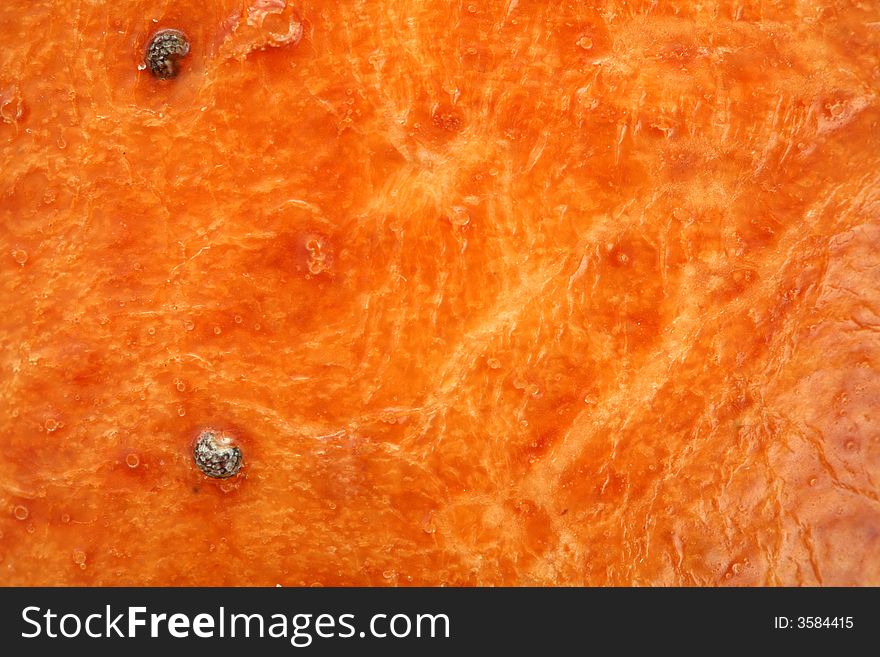 Fresh bread with a cheese crust, background