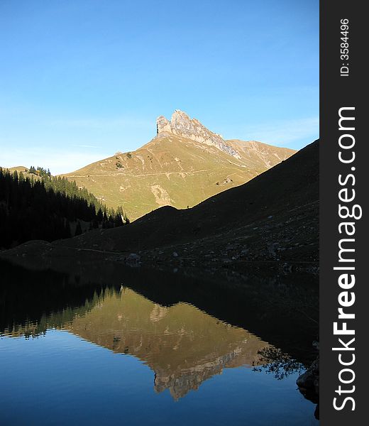 Mountain lake mirror in Bannalp, Switzerland. Mountain lake mirror in Bannalp, Switzerland