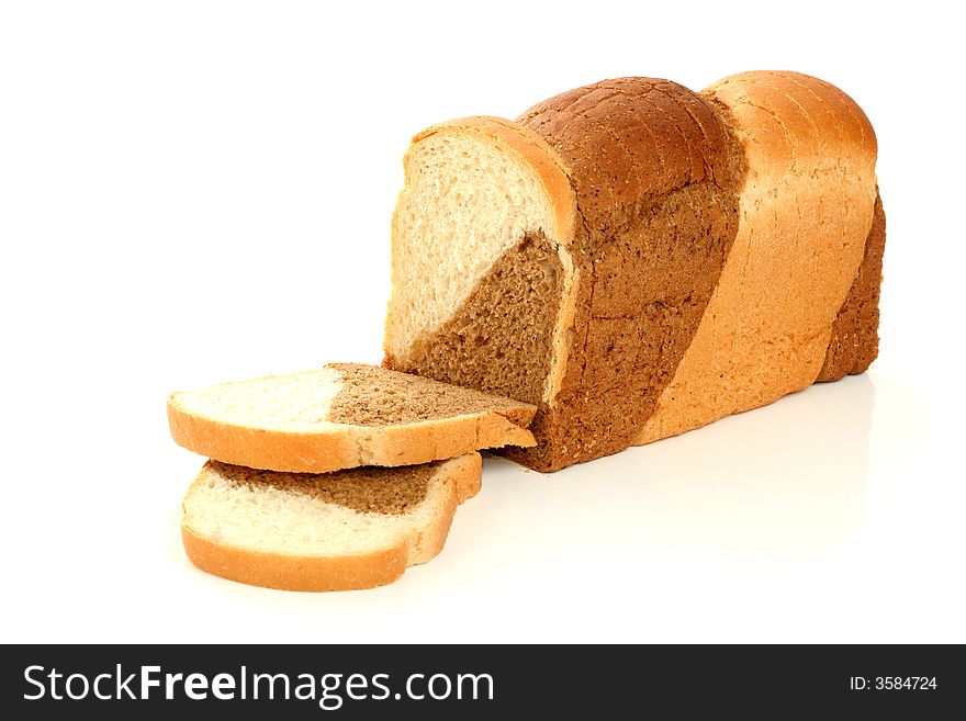 Loaf of multicoloured bread, isolated