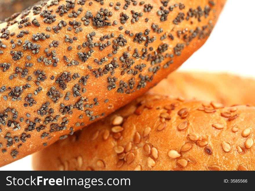 Sweet buns with poppy and sesame, isolated