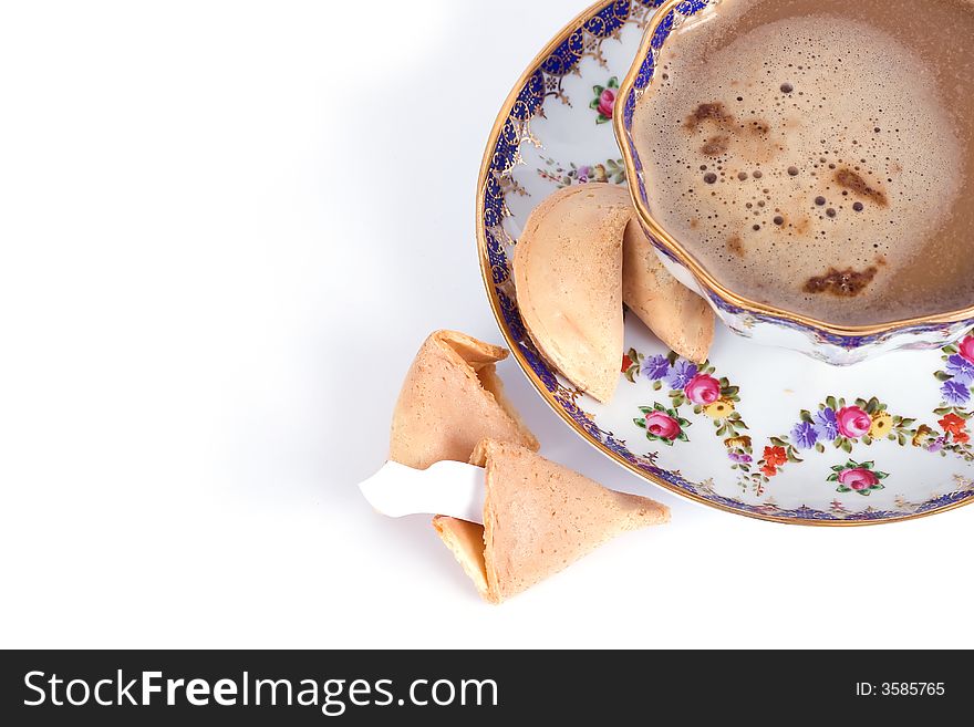 Cup of cappuccino and fortune cookie with blank card