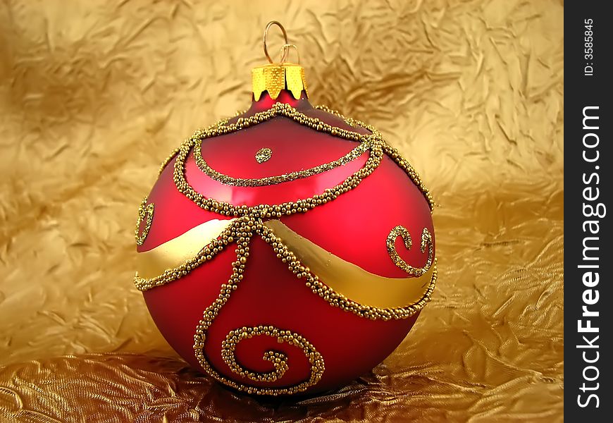 One red bulb on the gold background. One red bulb on the gold background