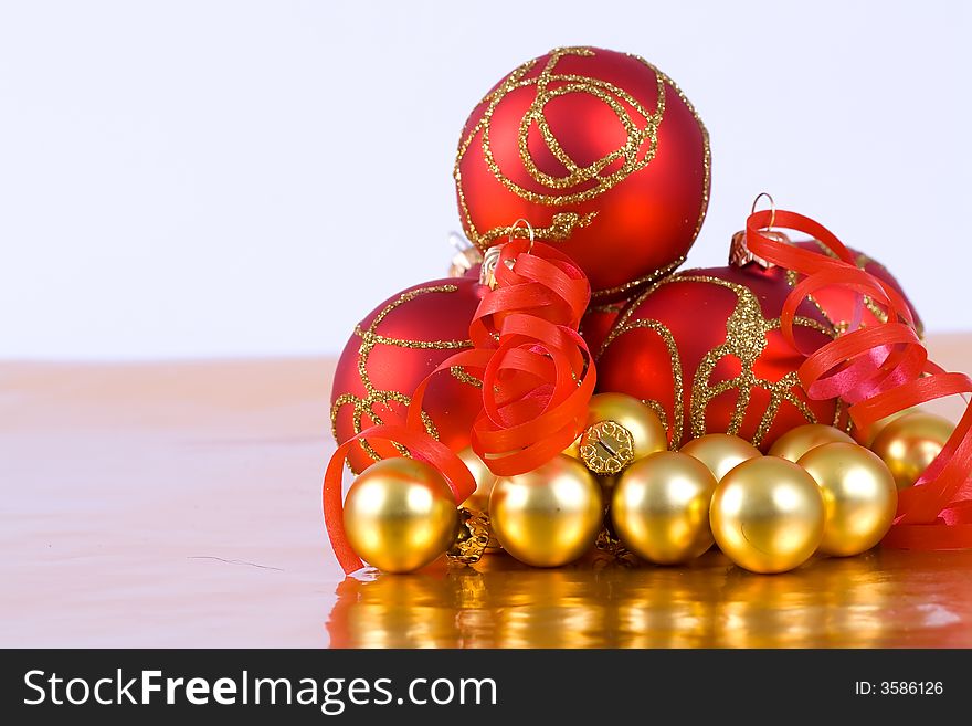 Christmas red and gold balls with ribbon. Christmas red and gold balls with ribbon