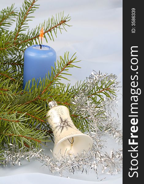 Christmas still life with blue candle