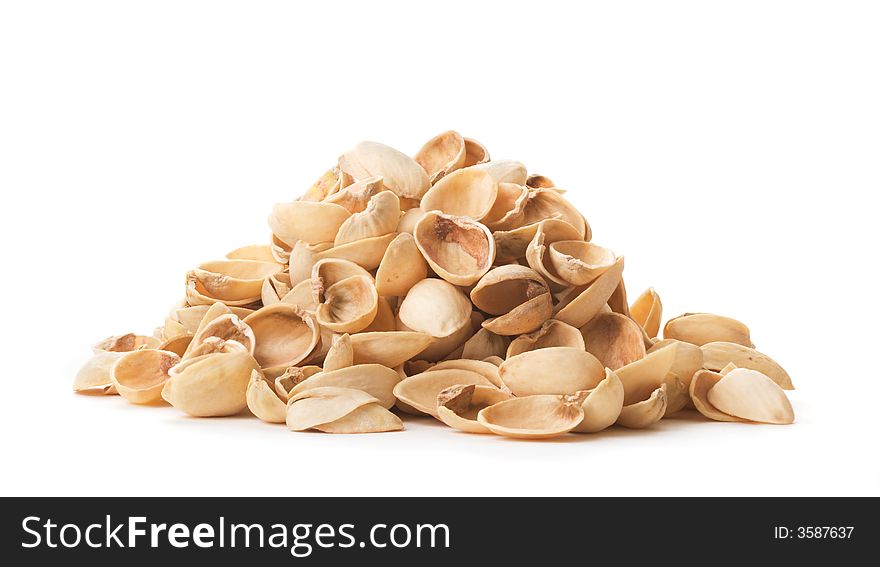 A pile of empty pistachio shells.