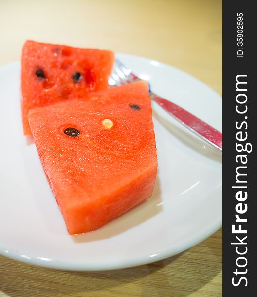 Fresh slices of red watermelon on the plate. Fresh slices of red watermelon on the plate.