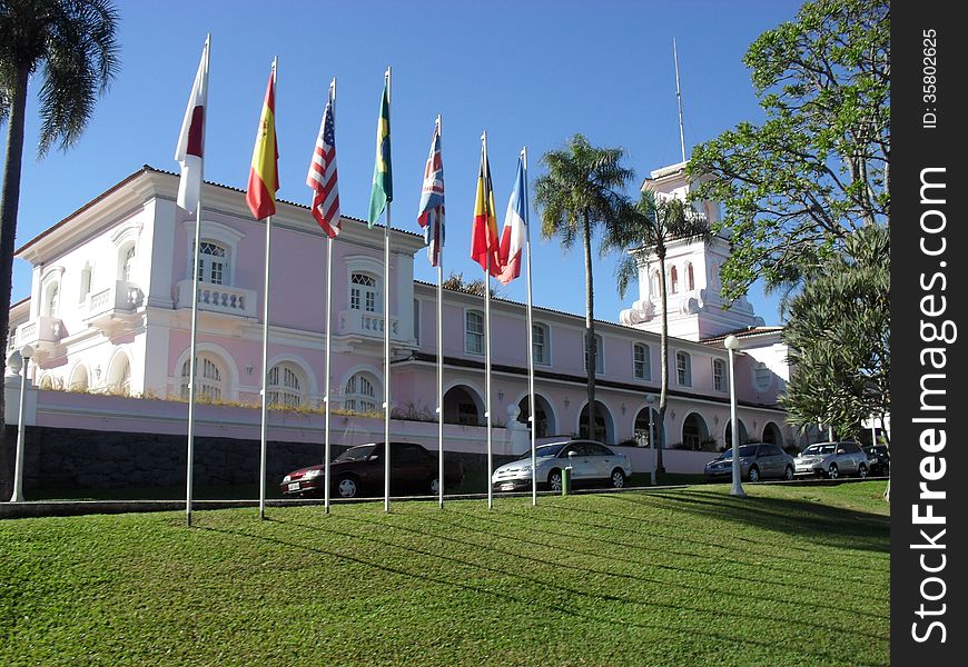Pink hotel with flags of different countries