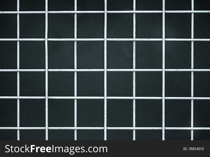 Iron lattice on a dark background