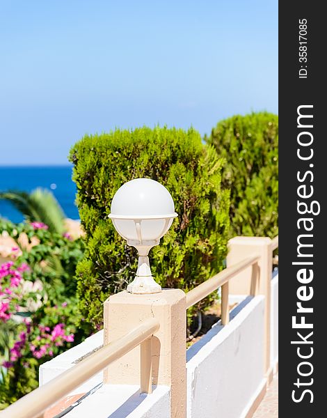 Small lantern in a garden on the ground. Small lantern in a garden on the ground