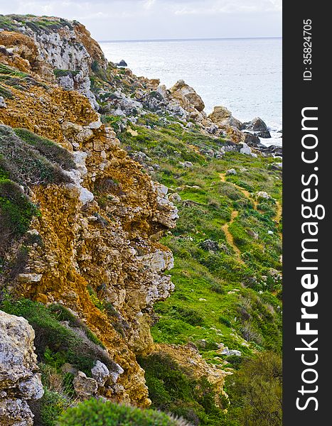 A view of the cliffs near golden bay, malta. A view of the cliffs near golden bay, malta