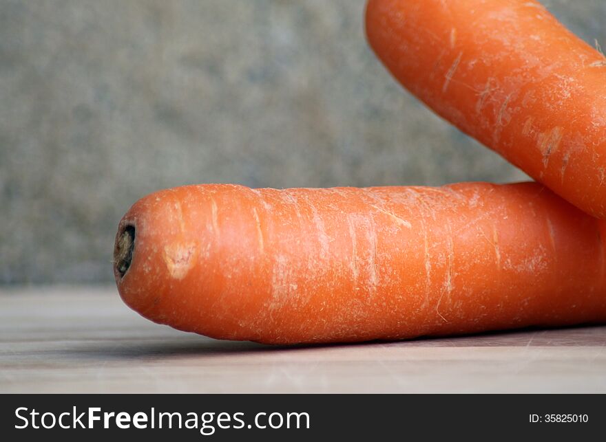 Closeup of ripe carrots on studio background.