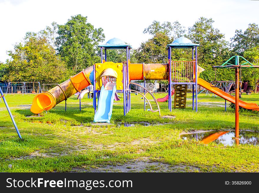 Playground park on grass near school is children