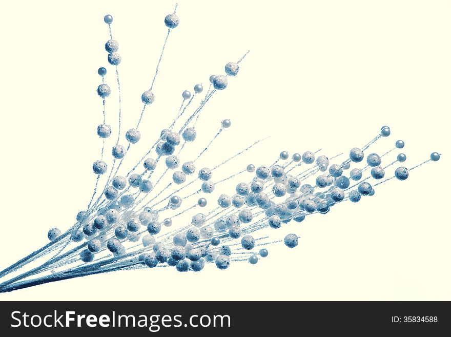 Holiday decoration- blue color twig with many small bubbles. Isolated over white background. Holiday decoration- blue color twig with many small bubbles. Isolated over white background.