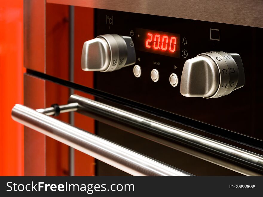 Modern electric oven with digital display and controls. Modern electric oven with digital display and controls