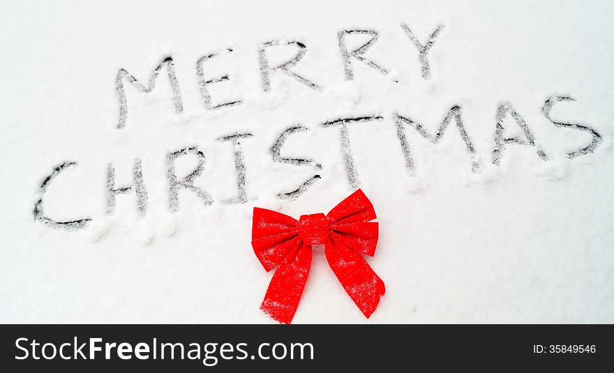 Merry Christmas Words Written in Snow