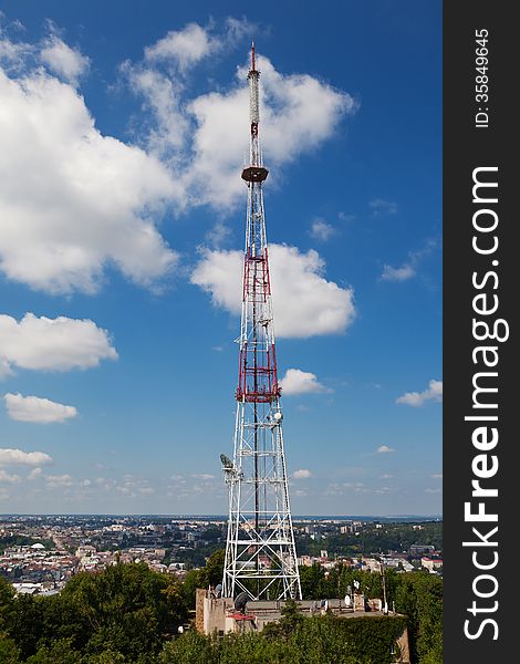 Telecommunication tower on blue sky background