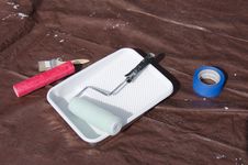 House Painting Supplies On A Paint Tarp Royalty Free Stock Photography House Painting Supplies On A Paint Tarp Royalty Free Stock Photography