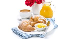Croissants With Butter, Cup Of Coffee And Juice For Breakfast Royalty Free Stock Photography