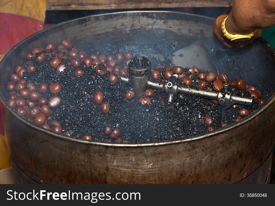 Roasting chestnuts Malaysia a street food