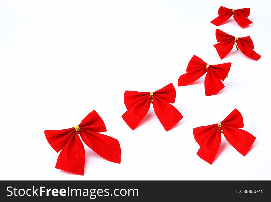 Red ribbons on a white backround.