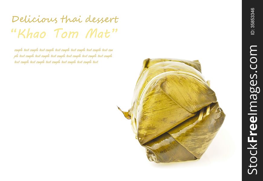 Isolated of deciduous Khao Tom Mat pack on white background with text space. Khao Tom Mat is thai dessert. it make from sticky-rice sugar banana and wrap in banana leaf. final is cooked with steam. Isolated of deciduous Khao Tom Mat pack on white background with text space. Khao Tom Mat is thai dessert. it make from sticky-rice sugar banana and wrap in banana leaf. final is cooked with steam