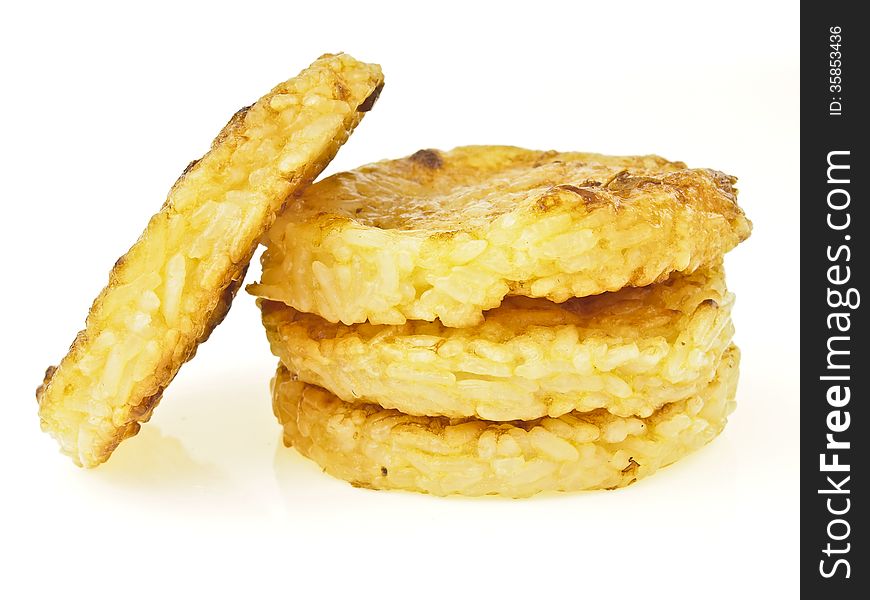 Triple stack of Kgawhie snack on white background. Kgawhie is thai street food. it made from sticky-rice and egg. cooking by grilling. Triple stack of Kgawhie snack on white background. Kgawhie is thai street food. it made from sticky-rice and egg. cooking by grilling.